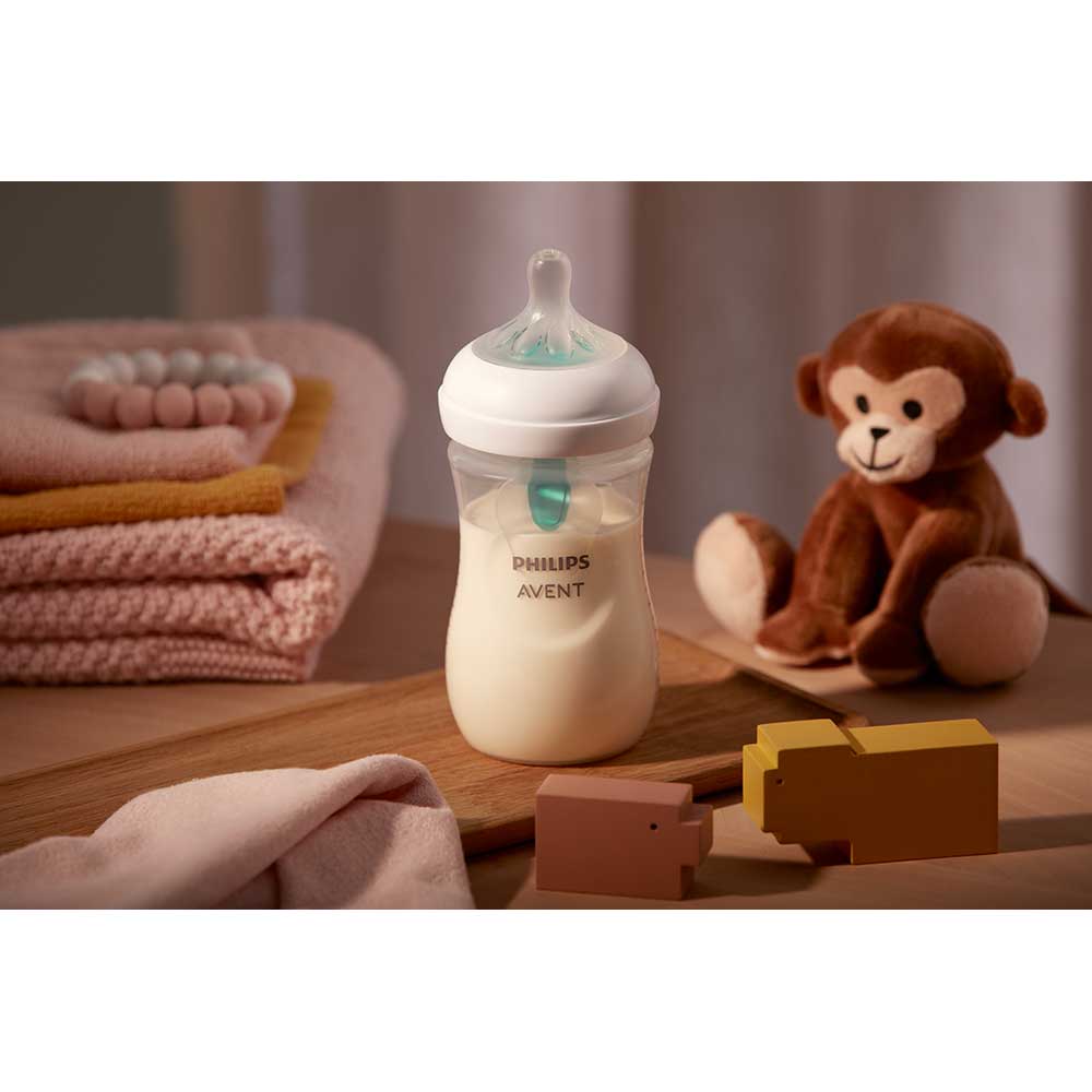 Set PHILIPS AVENT Natural Response SCD657/11: 2 biberoane 125ml + 2 biberoane 260ml + 2 dispozitive AirFree + suzeta + perie biberon, flux lent, 0 luni+, multicolor