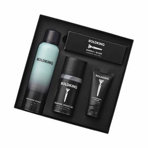 Set pentru barbierit The Giftbox cu aparat de ras, gel de ras spuma 75ml, crema after shave 50ml, gel de dus spuma 200ml